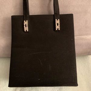Very gently used black evening bag.